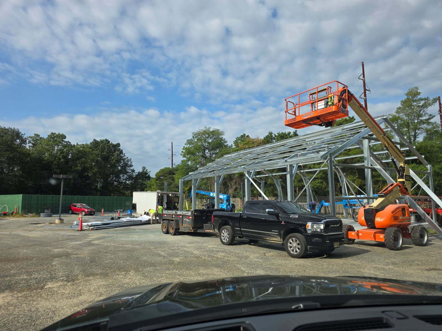 Real steel building installation underway at a project site