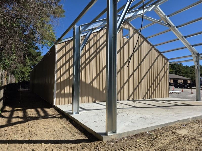 Steel frame and wall panels during building installation